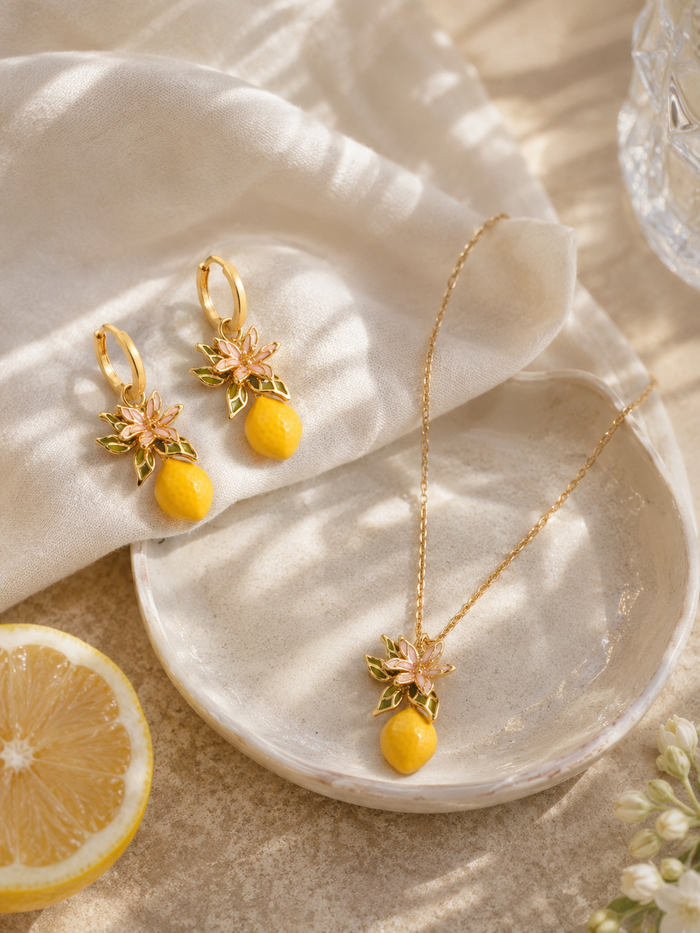 Jewelry Set with Drop lemon and blossom accent Earrings and gold chain necklace with a lemon and floral accents 