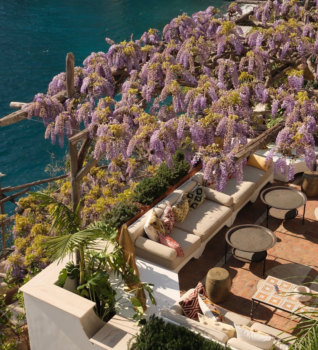 Blooming wisteria overlooking a scenic Positano terrace