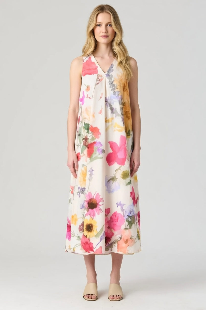 Maria Long Dress_Woman wearing a sleeveless floral midi dress